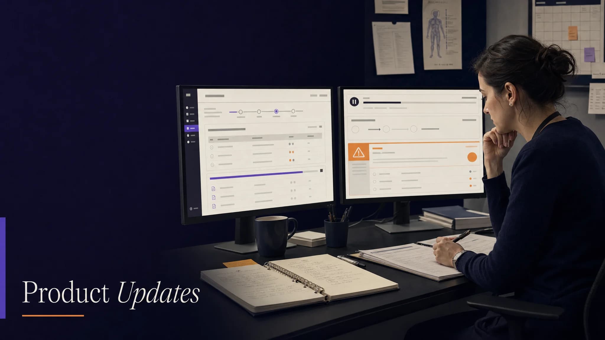 A woman sits at a desk with two monitors displaying product updates, notes, and a coffee cup nearby.